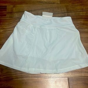 White pleated skort